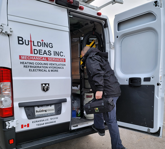 Building Ideas Inc. service van with technician in Toronto